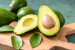 © Pixel-Shot - Fresh ripe avocados on wooden boards