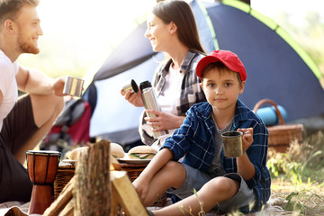 Poster - Little boy with family spending weekend in forest