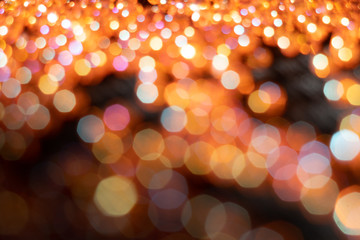 Orange sparkle glitter abstract bokeh background Christmas