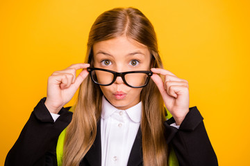 Poster - Close up photo of astonished kid looking wear bag backpack rucksack isolated over yellow background