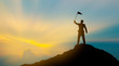 © BNMK0819 - silhouette of man on mountain top over sky and sun light background,business, success, leadership, achievement and people concept