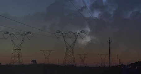 Wall Mural - transmission towers and lightning in clouds