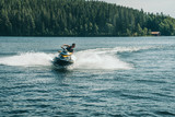 Jetski playing during summer on a lake