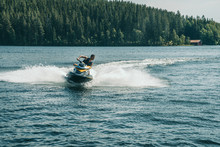 Jetski Playing During Summer On A Lake
