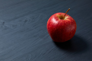 fresh apple on the black background