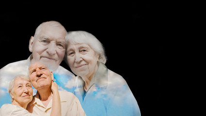 Wall Mural - The elderly couple on black background