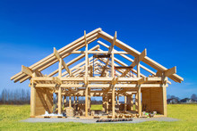 Frame House Under Construction. Construction Site On A Sunny Day. House From Laminated Veneer Timber. Remodeling Of The Cottage. The House Wooden Base. Houses To Order. Production Of Wooden Houses.