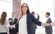 © ASDF - greeting gesture business woman smiling
