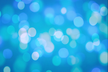 Winter elegant bokeh background. Seasonal cooling light decorative abstract design element.