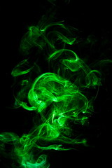 Green smoke on black background