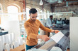 © zinkevych - Bearded man printing posters for social campaign