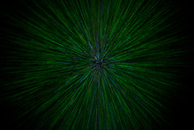 Natural Lens Zoom Explosion Radial Blurred Green Particles On Black Background With Selective Focus