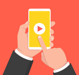 Wall Mural - hands holding smartphone and touching screen. video player on screen. vector illustration.