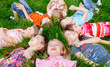 © Andrey - A group of happy children of boys and girls run in the Park on the grass on a Sunny summer day . The concept of ethnic friendship, peace, kindness, childhood