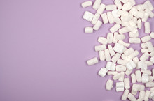 White Foam Filler For Filling Parcels During Transportation On A Lilac Background
