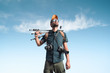 © Happyphotons - Portrait of a photographer with photographic equipment.