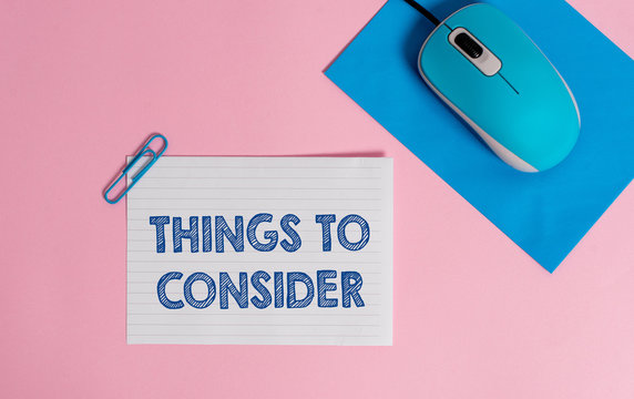 Text sign showing Things To Consider. Business photo showcasing think about carefully especially in making decisions Wire electronic mouse striped blank paper sheets clip colored background