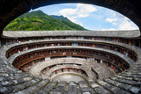 fujian tulou (hakka roundhouse). The Red paper with chinese words are couplets with lucky poem