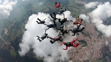 Skydivers Having Fun In The Sky