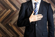 © beeboys - 木目背景とビジネスマン