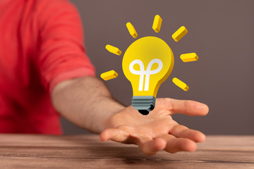 idea lamp concept in hand