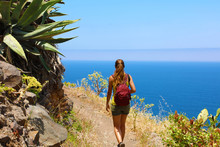 Young Hiker Woman Walking On A Trail Overlooking The Sea In Tenerife