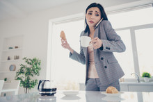 Close Up Photo Beautiful Tired She Her Lady Cup Pot Hot Beverage Table Croissant Hand Arm Late Job Quickly Speak Tell Say Telephone Formal-wear Checkered Plaid Costume Bright White Kitchen Indoors