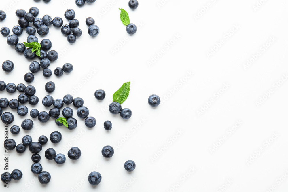 Many ripe blueberry on white background