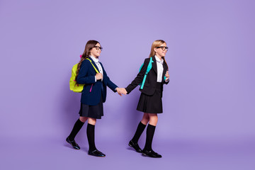 Canvas Print - Full body photo of cute children route school courses wear long socks skirt eyewear eyeglasses isolated over violet purple background