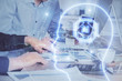© peshkova - Man with computer background with brain theme hologram. Concept of brainstorm. Double exposure.