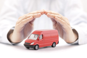 Poster - Transport red van car protected by hands 