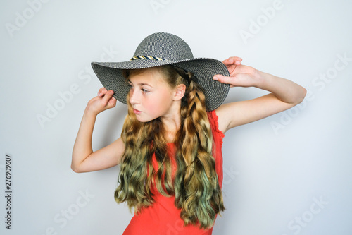 Attractive Caucasian Girl Wearing Red Dress And Round Hat Summer