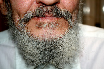 Gray beard and mustache. Old man. Granddad.