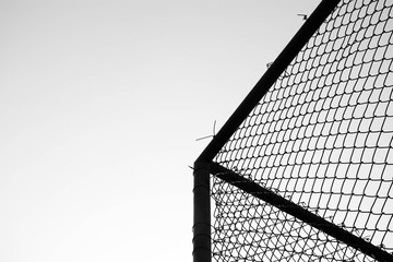 Poster - cage metal wire on pale grey background