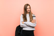 © luismolinero - Happy Young sport woman over isolated pink background with a bottle of water