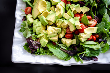 Organic vegetable salad with avocado rich in vitamins and fiber ready to eat