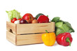 Wooden crate full of fresh products on white background