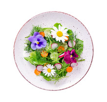 Vegetable Salad With Edible Flowers On White Background