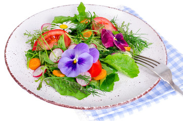 Canvas Print - Vegetable salad with edible flowers on white background