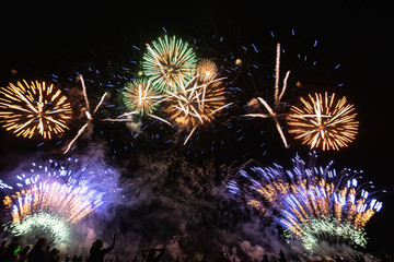 Real Fireworks footage 4k video on Deep Black Background Sky on Futuristic Fireworks festival show before independence day on 4 of July