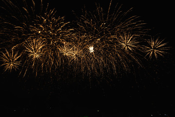 Real Fireworks footage 4k video on Deep Black Background Sky on Futuristic Fireworks festival show before independence day on 4 of July