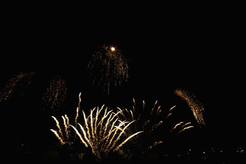 Real Fireworks footage 4k video on Deep Black Background Sky on Futuristic Fireworks festival show before independence day on 4 of July