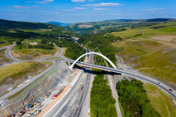Wall Mural - Aerial view of a new suspension bridge above roadworks (A465, Wales)