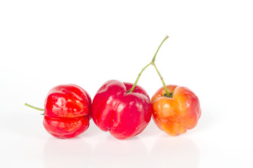 Wall Mural - Fresh Barbados cherry on white background, Isolated fruit object