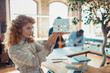 © zinkevych - Interior designer holding little house while starting project