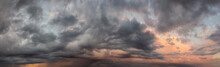 Dramatic Panoramic View Of A Cloudscape During A Dark, Rainy And Colorful Morning Sunrise. Taken Over Beach Ancon In Trinidad, Cuba.