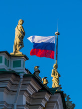 Waving Russian Flag On The Top Of The Hermitage Museum In St. Petersburg, Russia