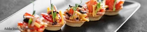 Delicious salad in tartlets. Concept of food, restaurant, cateri Fototapeta
