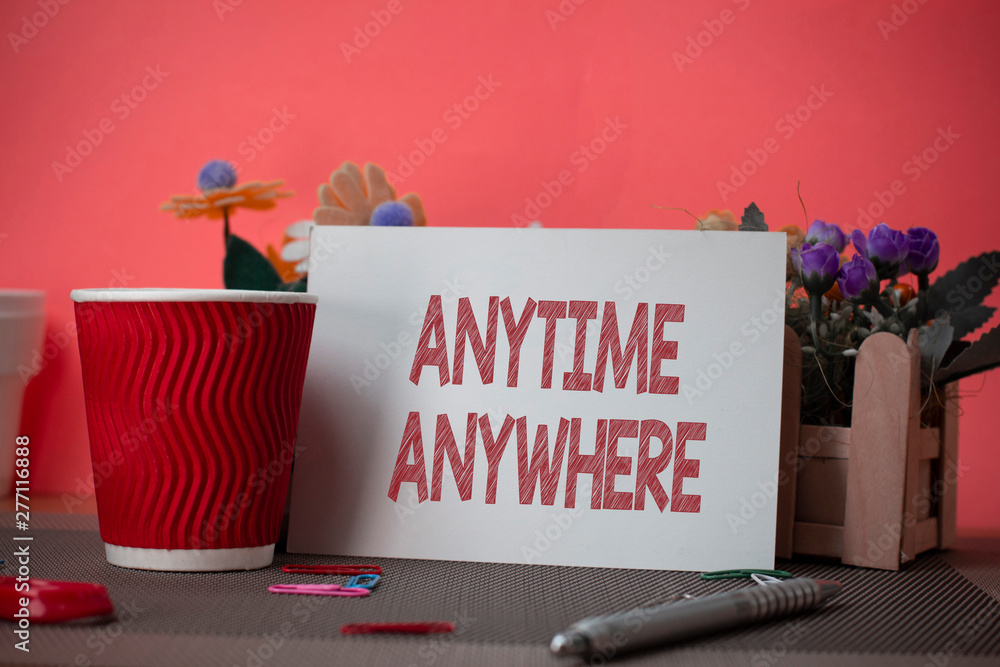 Writing note showing Anytime Anywhere. Business concept for saying that ...