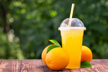 Poster - orange juice in plastic cup